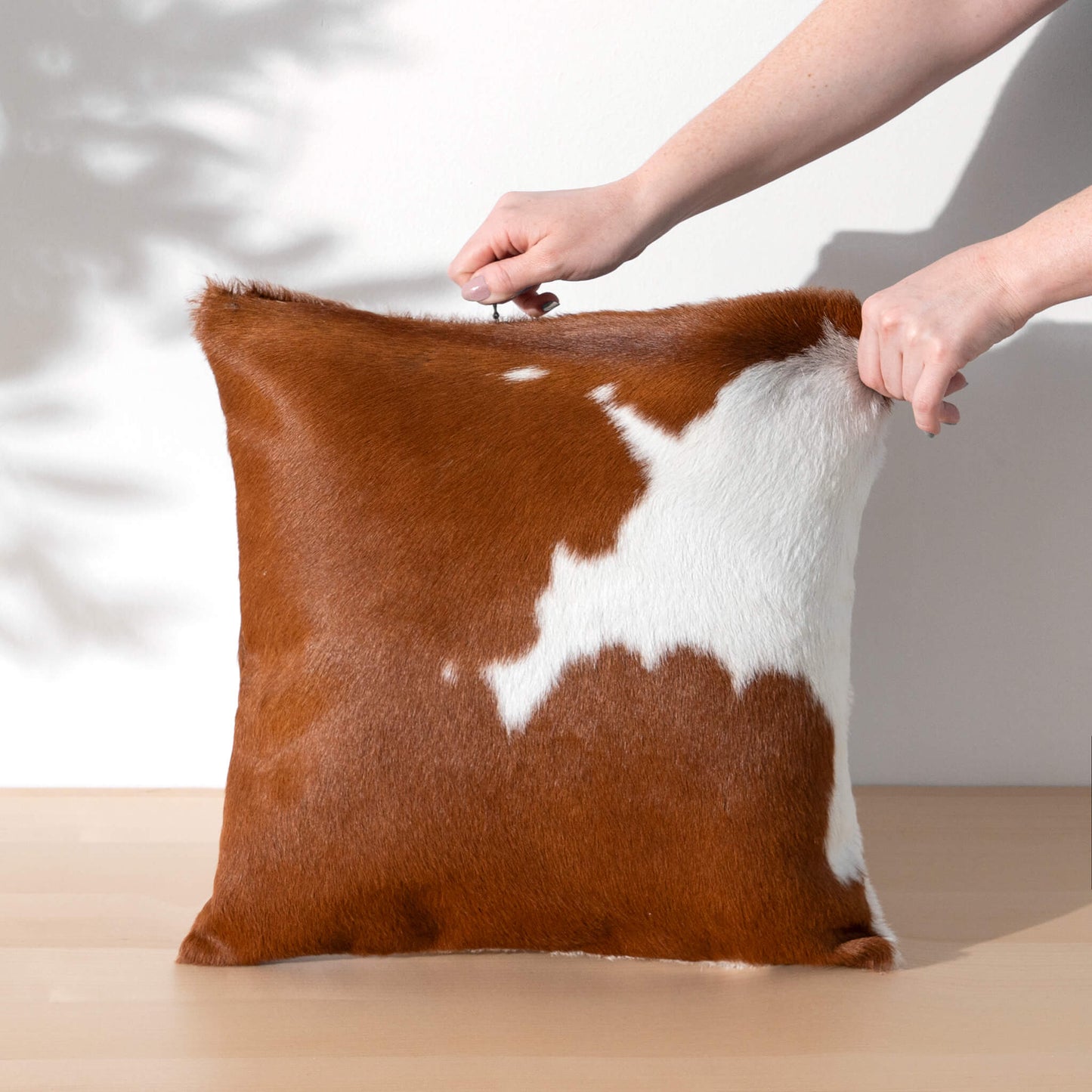 Brown and White Cowhide Pillow