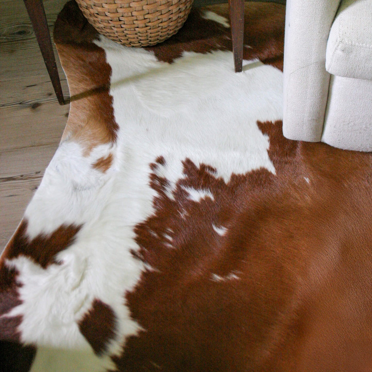 Brown and White Cowhide Rug