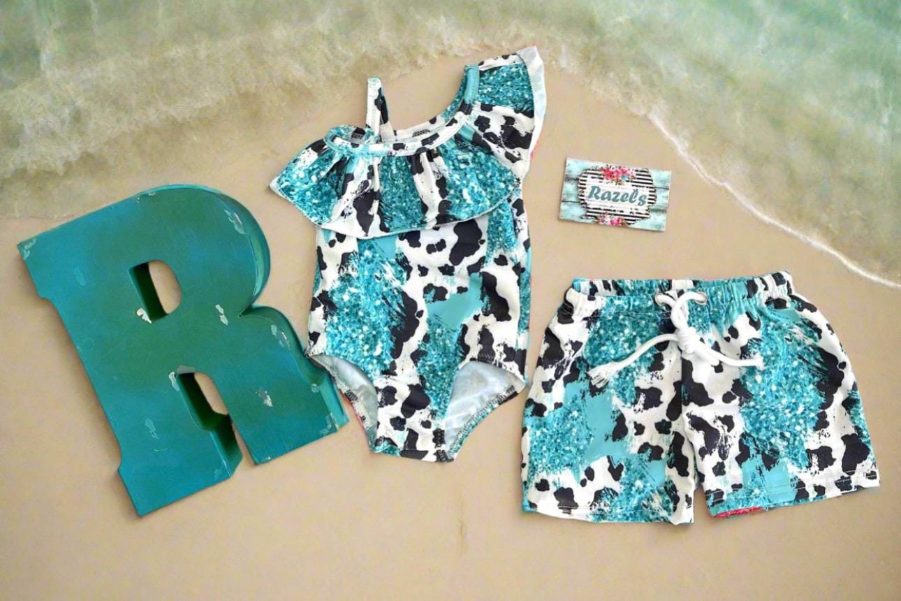 Boys Turquoise Cow Print Swim Trunks: Western Cowhide Shorts