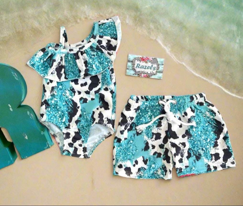 Boys Turquoise Cow Print Swim Trunks: Western Cowhide Shorts